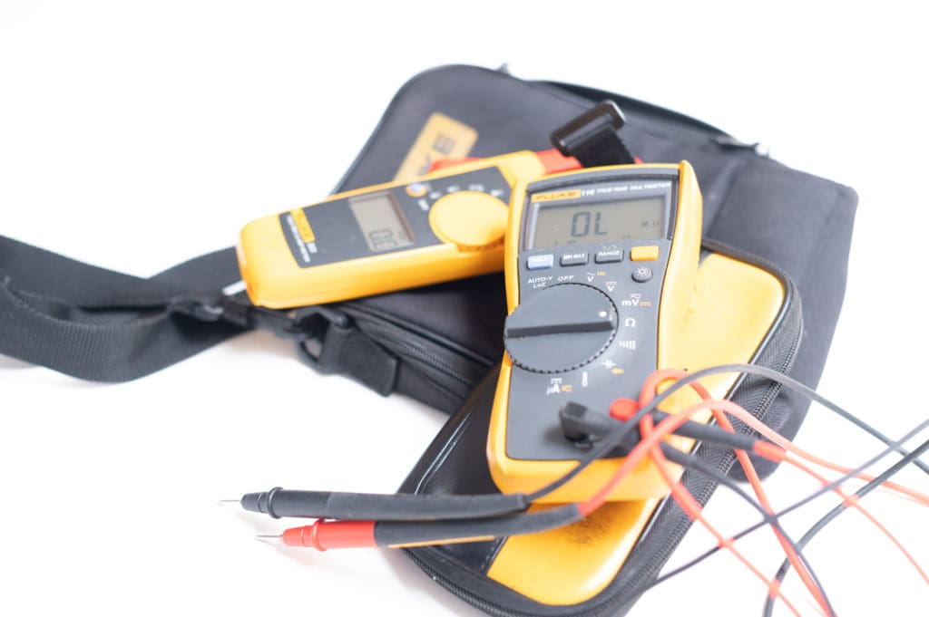 Refrigerator repair fluke digital multi meter and clamp meter